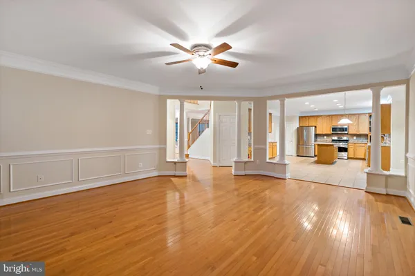 a kitchen with stainless steel appliances granite countertop cabinets and a stove top oven