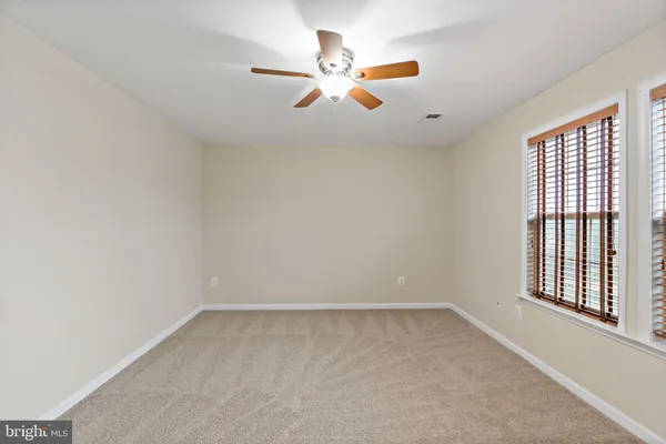 a view of a backyard of the house