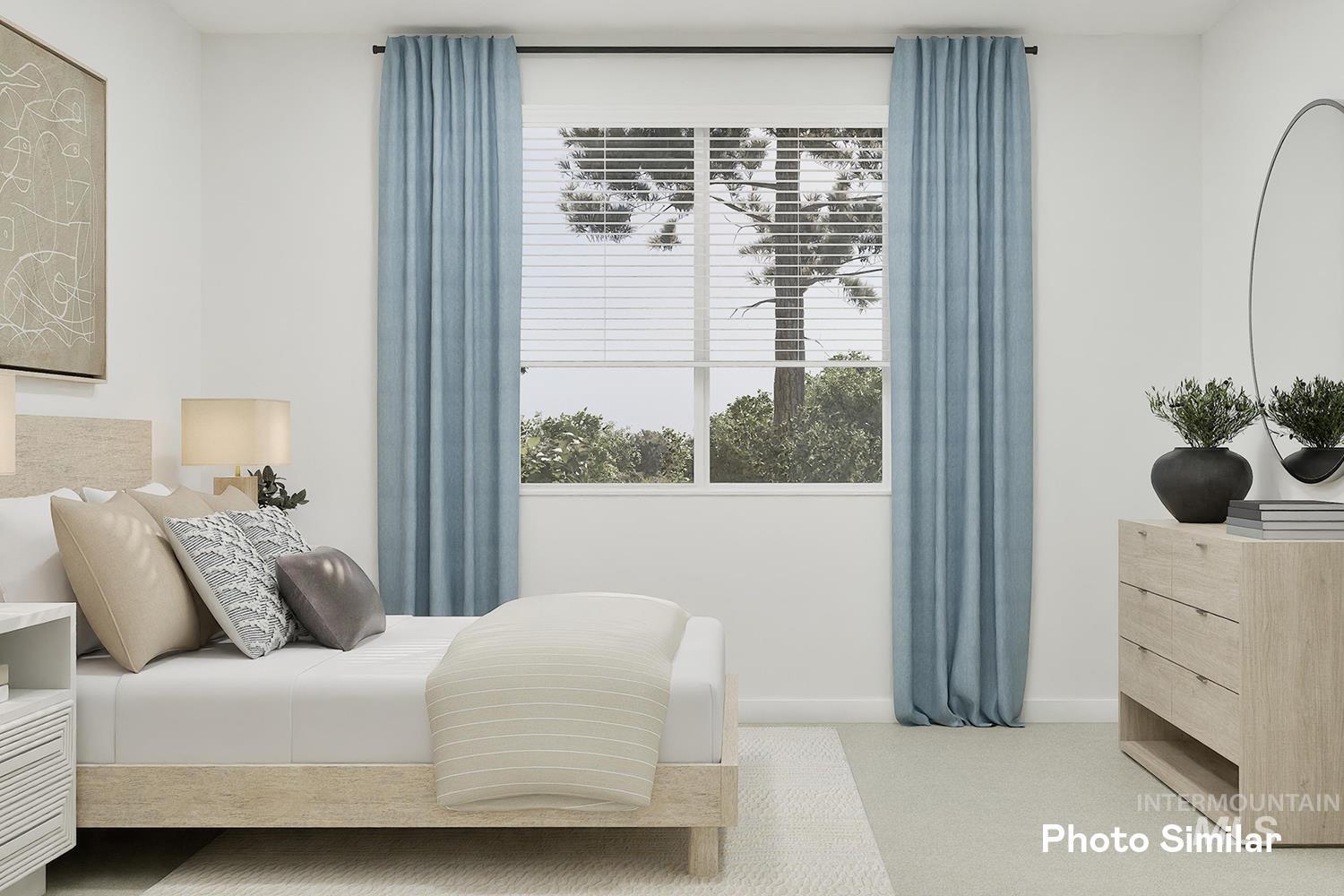 213 Ravello Street Caldwell, ID 83605 - Photo 16 of 25 Bedroom featuring baseboards