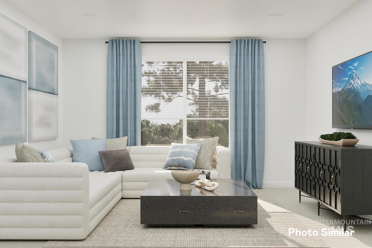 213 Ravello Street Caldwell, ID 83605 - Photo 18 of 25 Living area featuring carpet flooring and baseboards