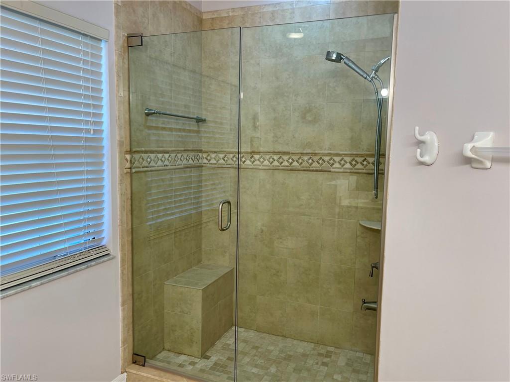 2895 Orange Grove Trail Naples, FL 34120 - Photo 24 of 33 a bathroom with a shower