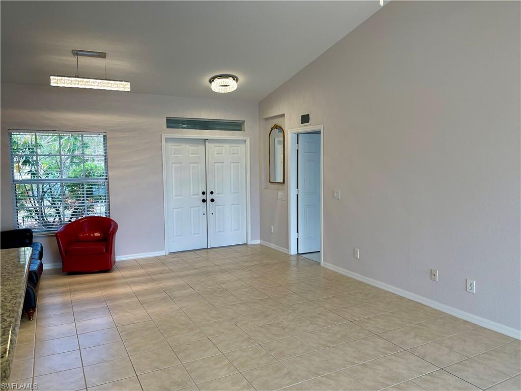 2895 Orange Grove Trail Naples, FL 34120 - Photo 27 of 33 a view of an empty room and window