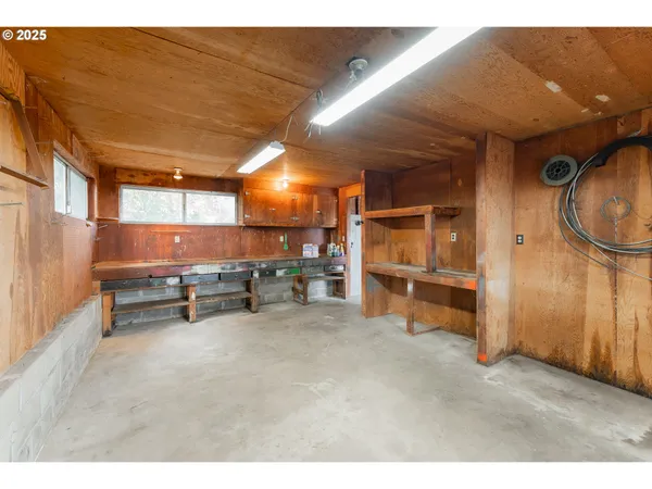 a view of an empty room with a fireplace