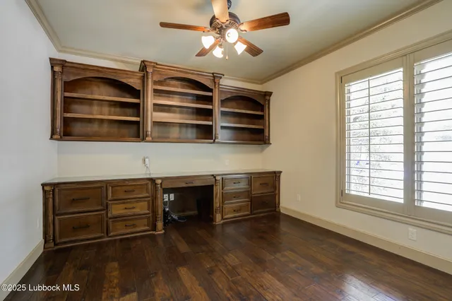 a view of a porch with furniture and a yard