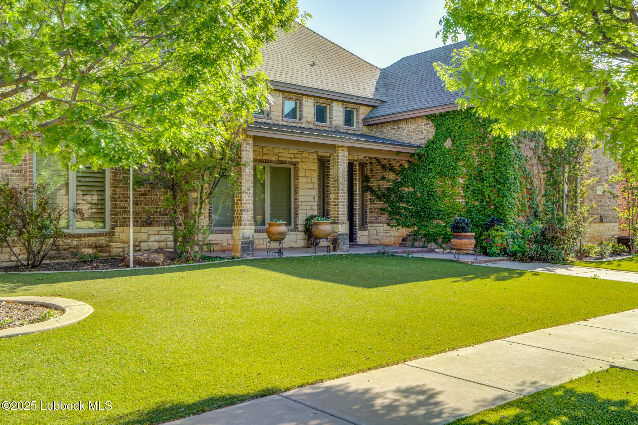 6103 89th Street Lubbock, TX 79424 - Photo 5 of 73 a view of a house with swimming pool and sitting area