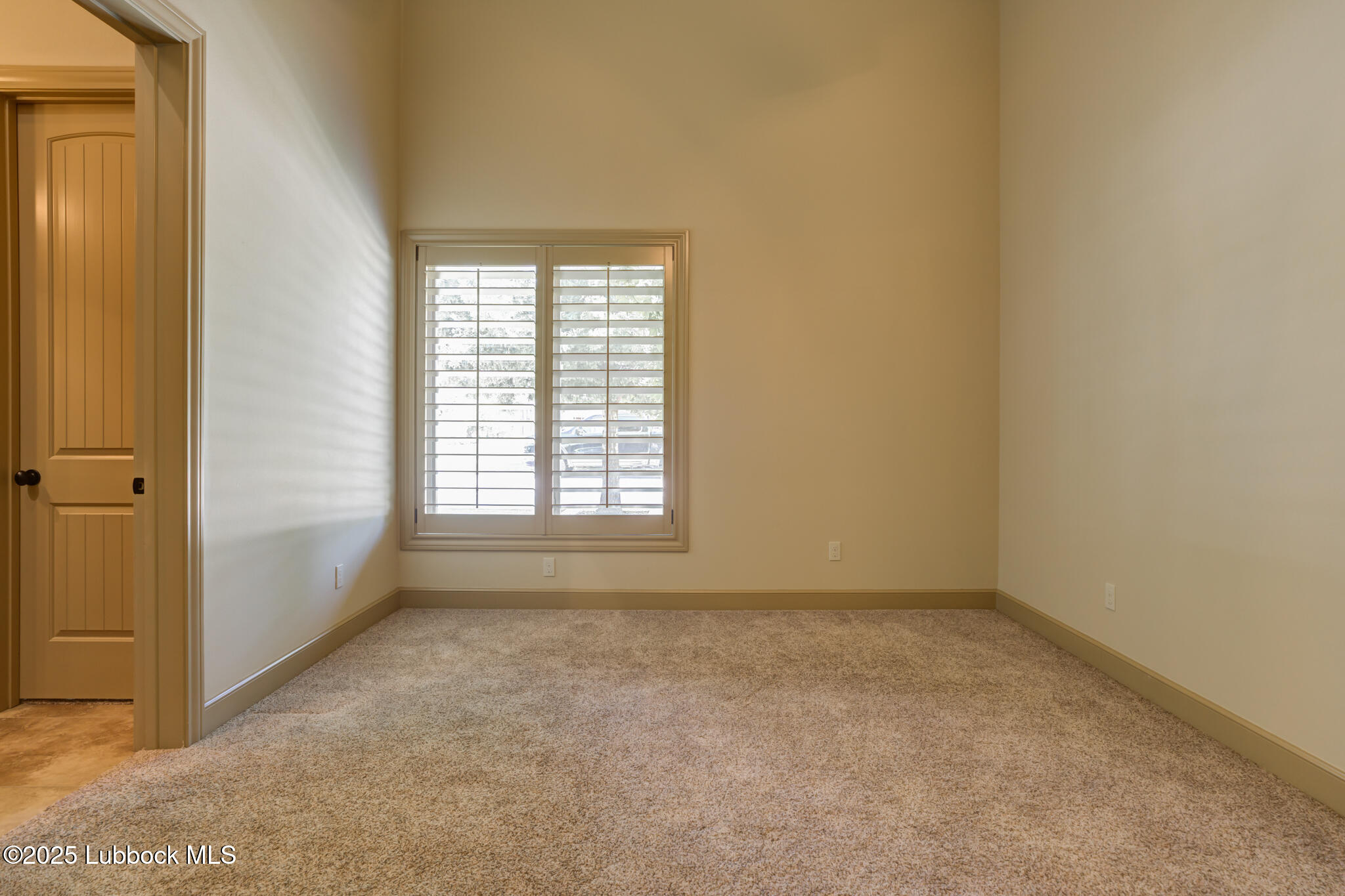 6103 89th Street Lubbock, TX 79424 - Photo 52 of 73 an empty room with a window