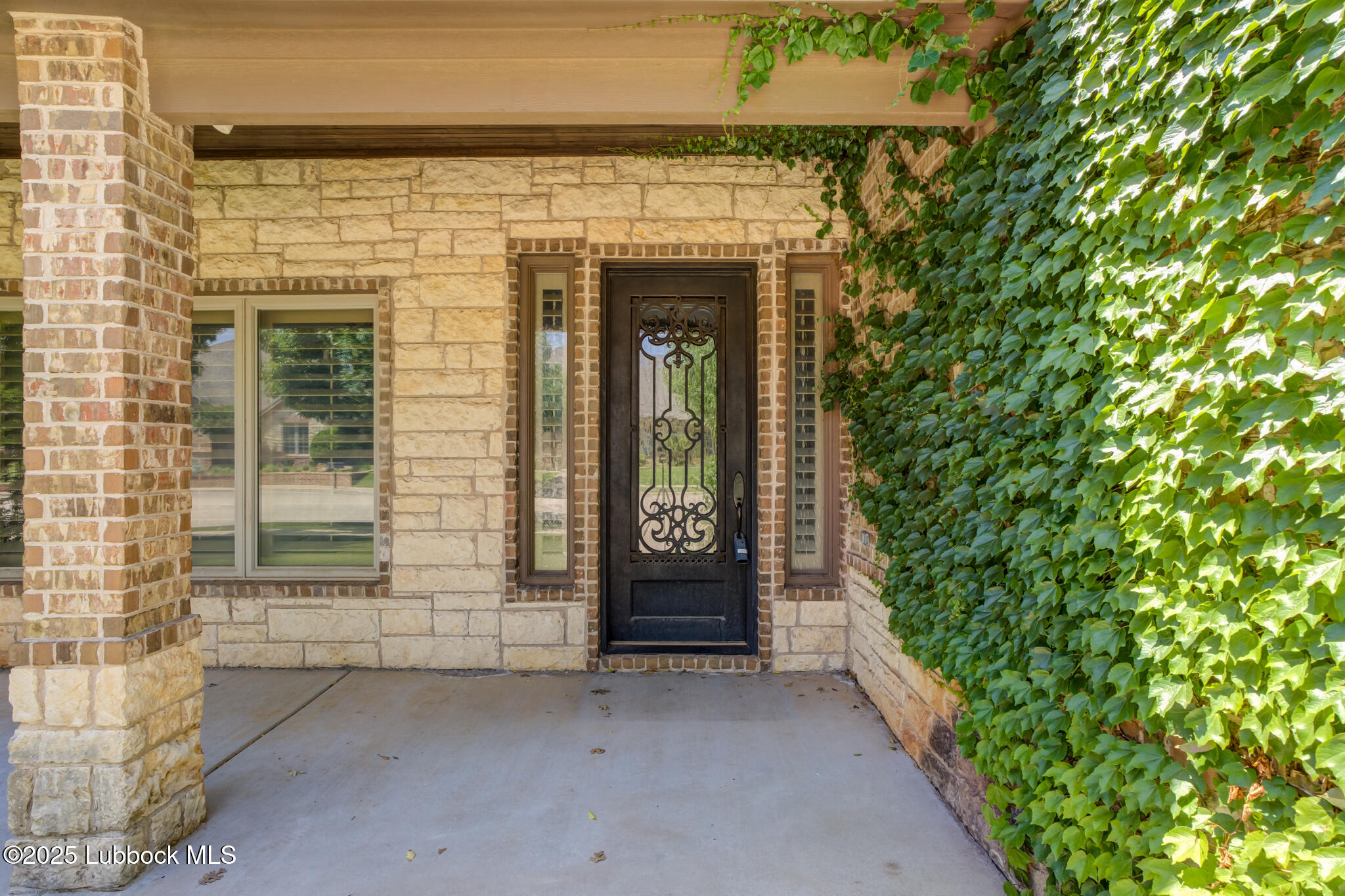 6103 89th Street Lubbock, TX 79424 - Photo 9 of 73 a front view of a house with a yard