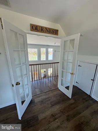a view of entryway with wooden floor