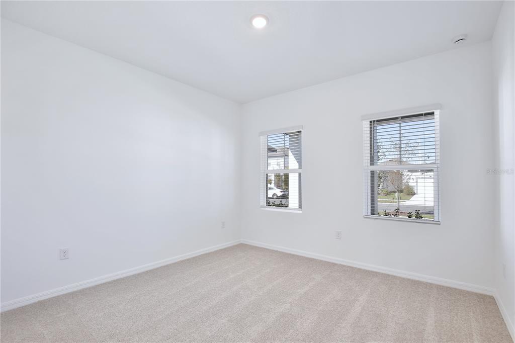 5724 Haystack Drive St. Cloud, FL 34771 - Photo 13 of 23 an empty room with a window