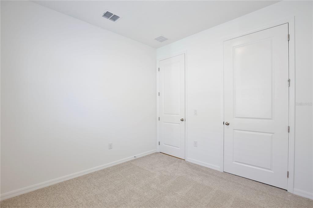5724 Haystack Drive St. Cloud, FL 34771 - Photo 19 of 23 a view of an empty room