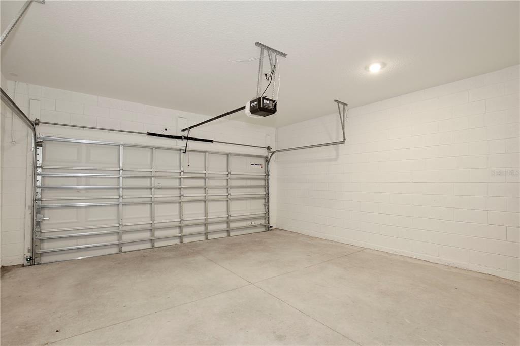 5724 Haystack Drive St. Cloud, FL 34771 - Photo 21 of 23 a view of a garage