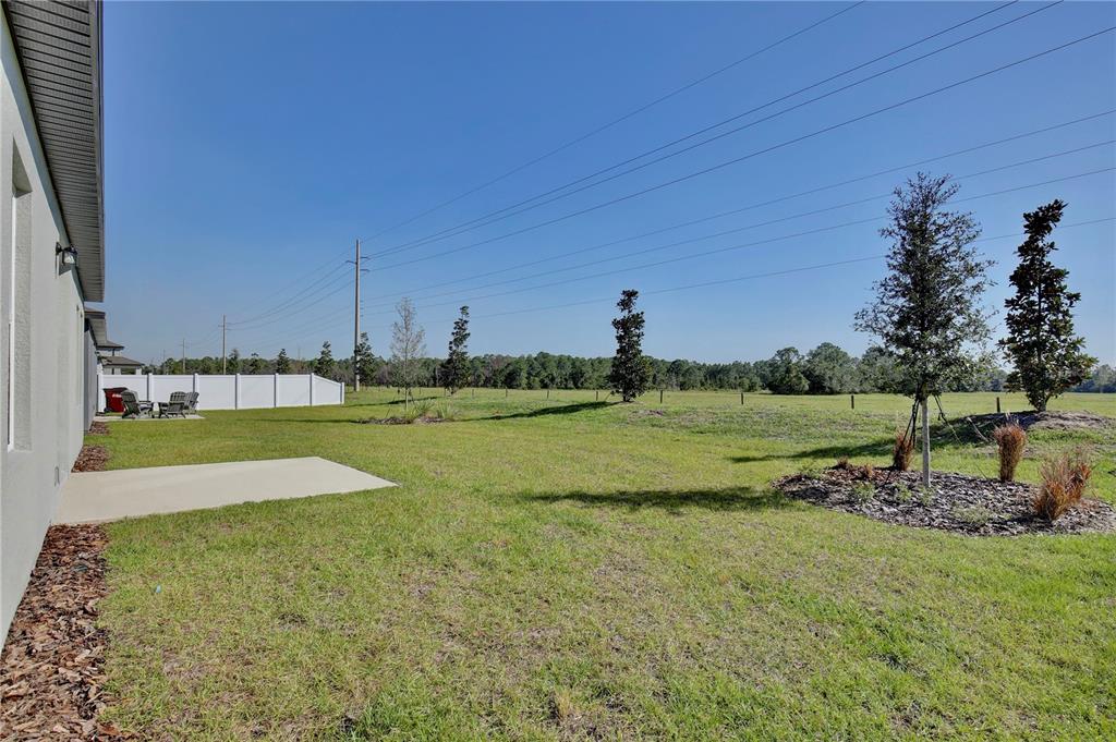 5724 Haystack Drive St. Cloud, FL 34771 - Photo 22 of 23 a view of a field with grass