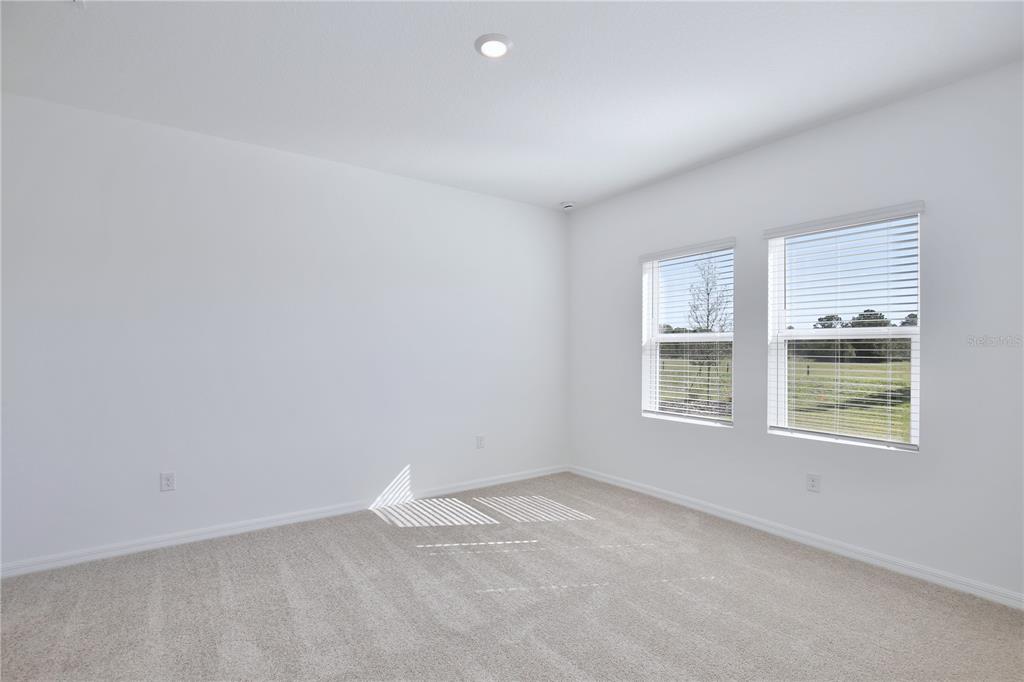 5724 Haystack Drive St. Cloud, FL 34771 - Photo 8 of 23 an empty room with a window