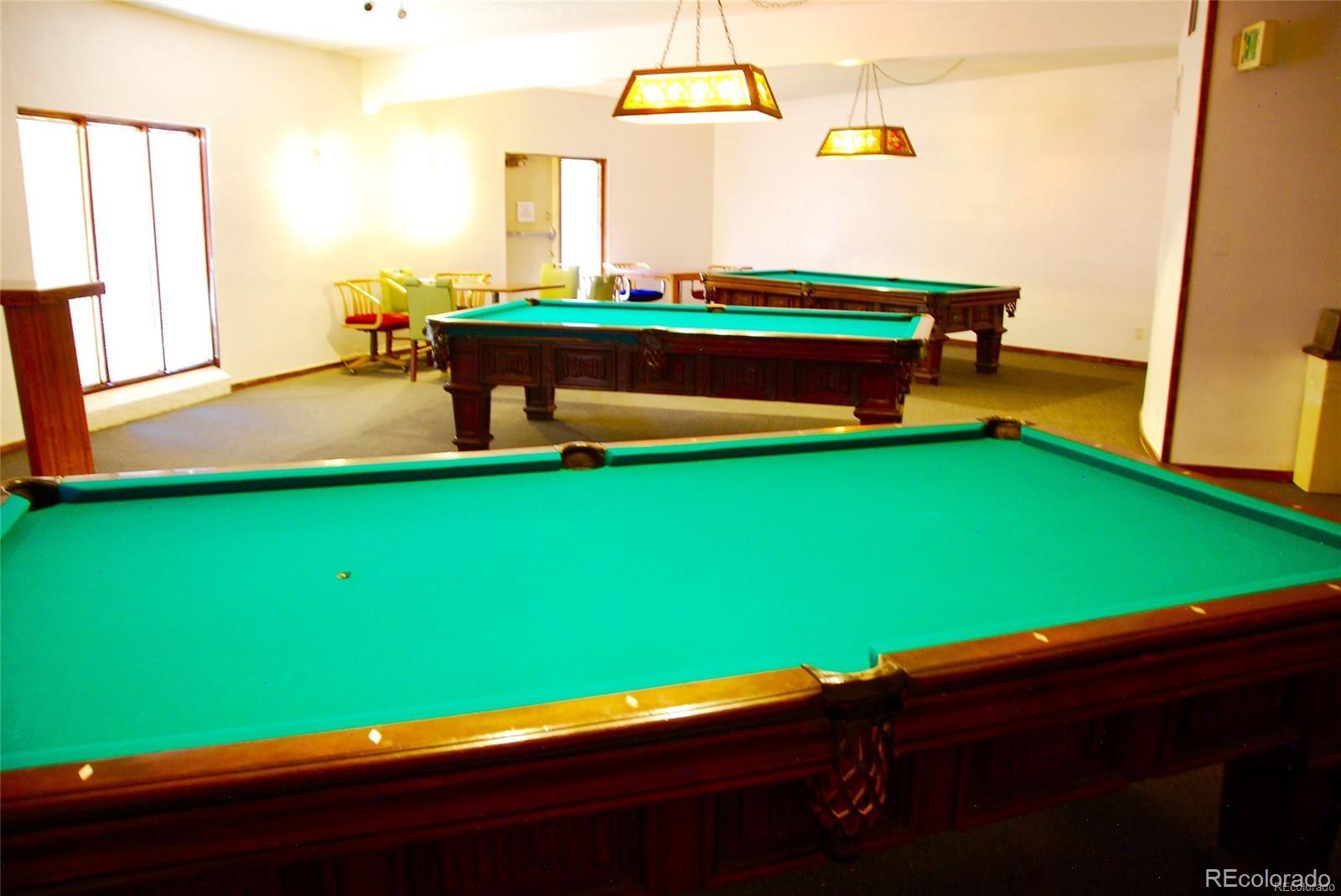 1304 South Parker Road, Unit 240 Denver, CO 80231 - Photo 13 of 19 a room with pool table and windows