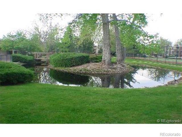 1304 South Parker Road, Unit 240 Denver, CO 80231 - Photo 17 of 19 a backyard of a house with lots of green space