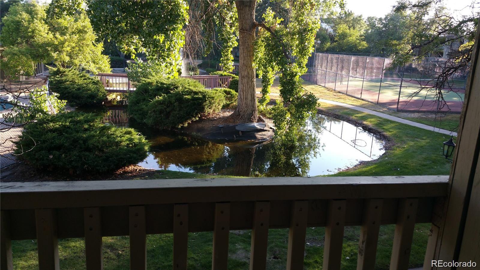 1304 South Parker Road, Unit 240 Denver, CO 80231 - Photo 7 of 19 a view of balcony with wooden floor