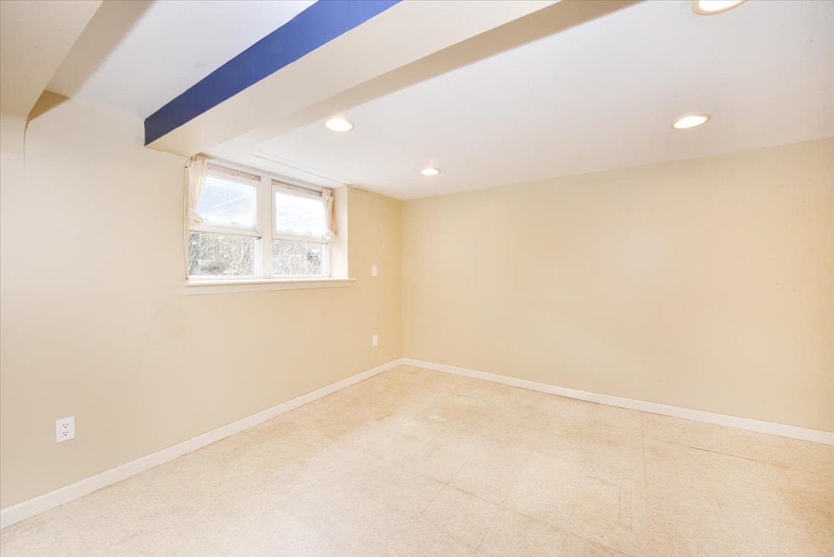85-76 66th Road Queens, NY 11374 - Photo 13 of 20 Basement with recessed lighting