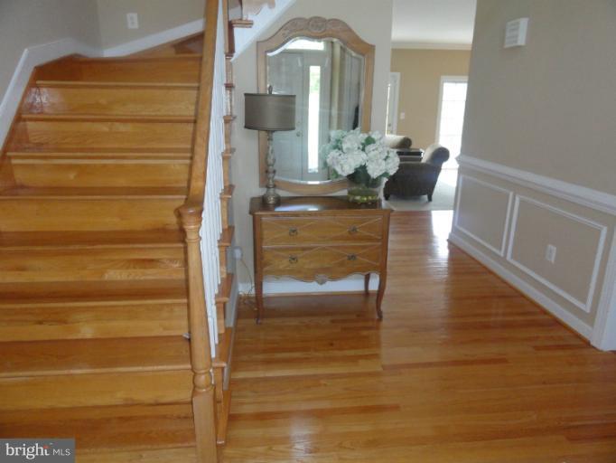 723 Sunpoint Road Davidsonville, MD 21035 - Photo 27 of 30 View of entrance/foyer with hardwood flooring
