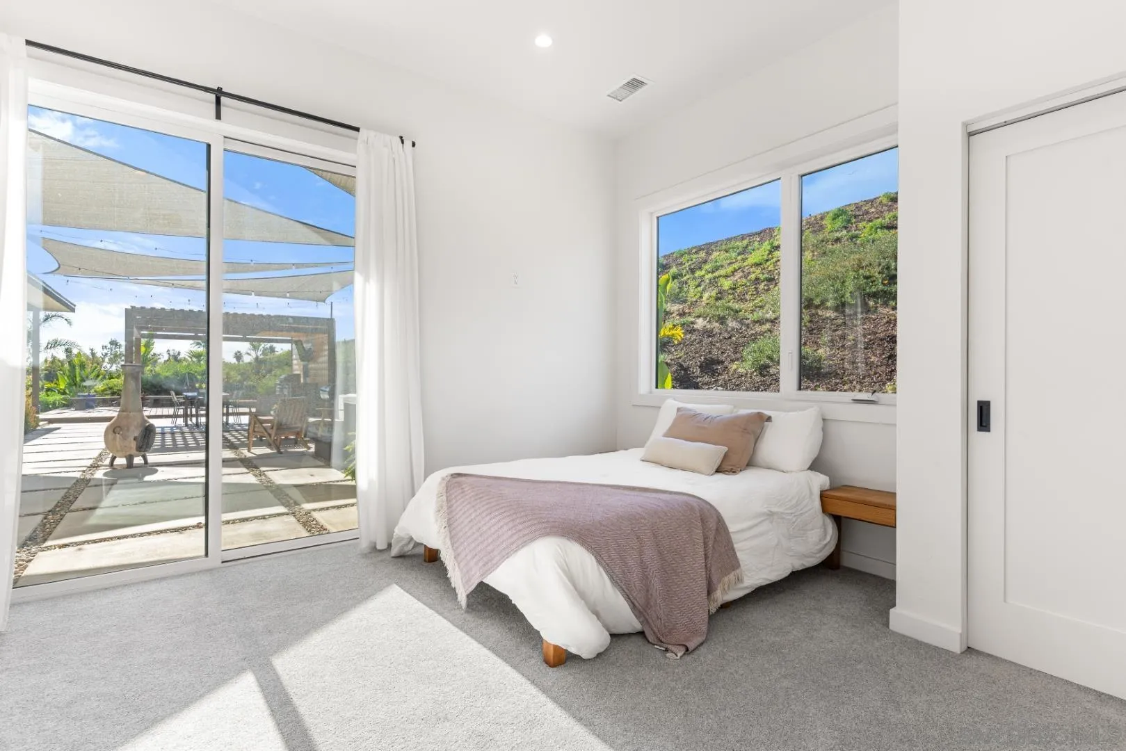4407 Ramona Drive Fallbrook, CA 92028 - Photo 11 of 27 a bedroom with a bed and a large window