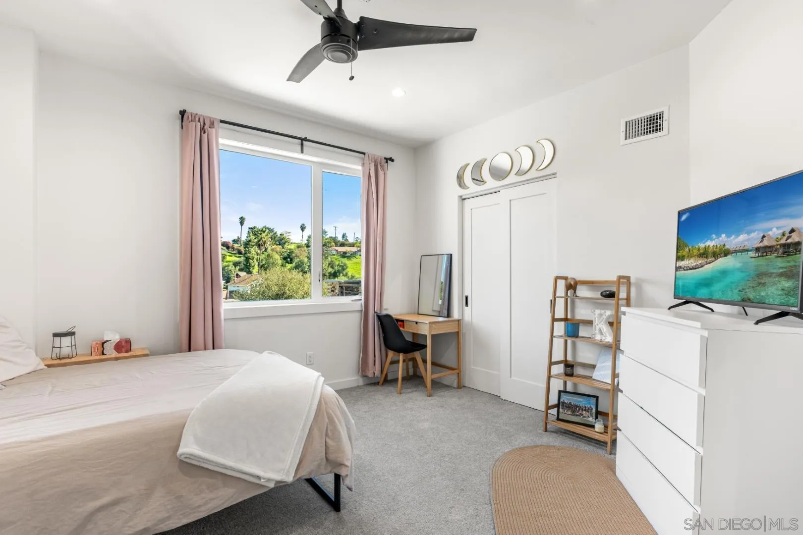 4407 Ramona Drive Fallbrook, CA 92028 - Photo 16 of 27 a bedroom with a bed and a window