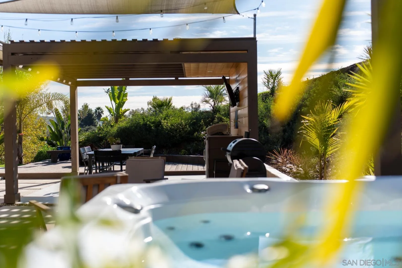 4407 Ramona Drive Fallbrook, CA 92028 - Photo 19 of 27 a view of a swimming pool with a patio and a yard