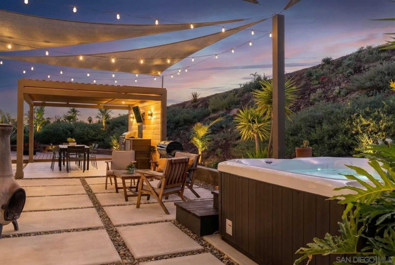 4407 Ramona Drive Fallbrook, CA 92028 - Photo 25 of 27 a view of a patio with couches table and chairs and potted plants