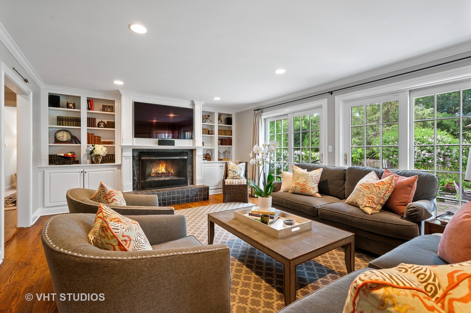1175 Hill Road Winnetka, IL 60093 - Photo 12 of 37 a living room with furniture fireplace and a large window