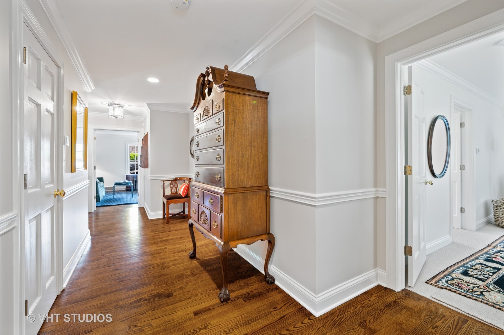 1175 Hill Road Winnetka, IL 60093 - Photo 20 of 37 a view of a hallway with wooden floor and staircase