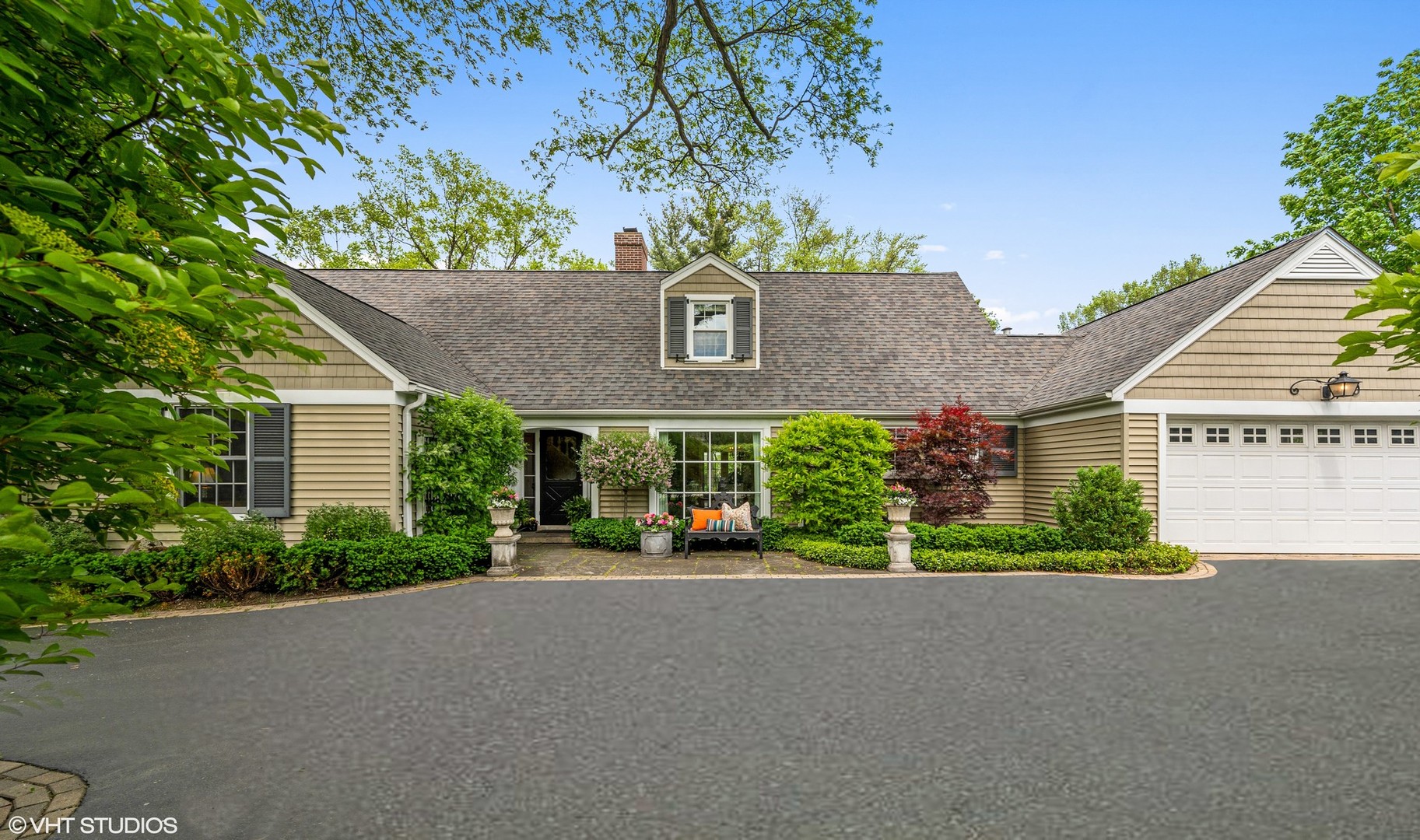 1175 Hill Road Winnetka, IL 60093 - Photo 3 of 37 front view of a house with a street