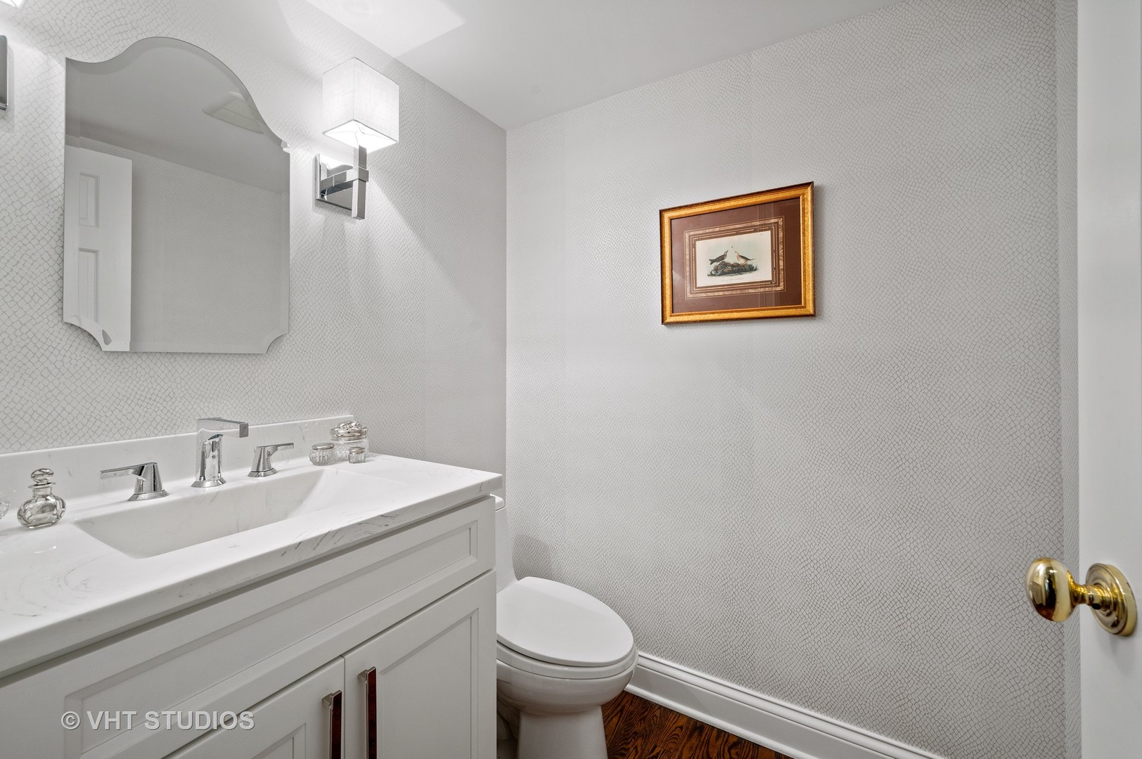 1175 Hill Road Winnetka, IL 60093 - Photo 22 of 37 a bathroom with a toilet sink and mirror
