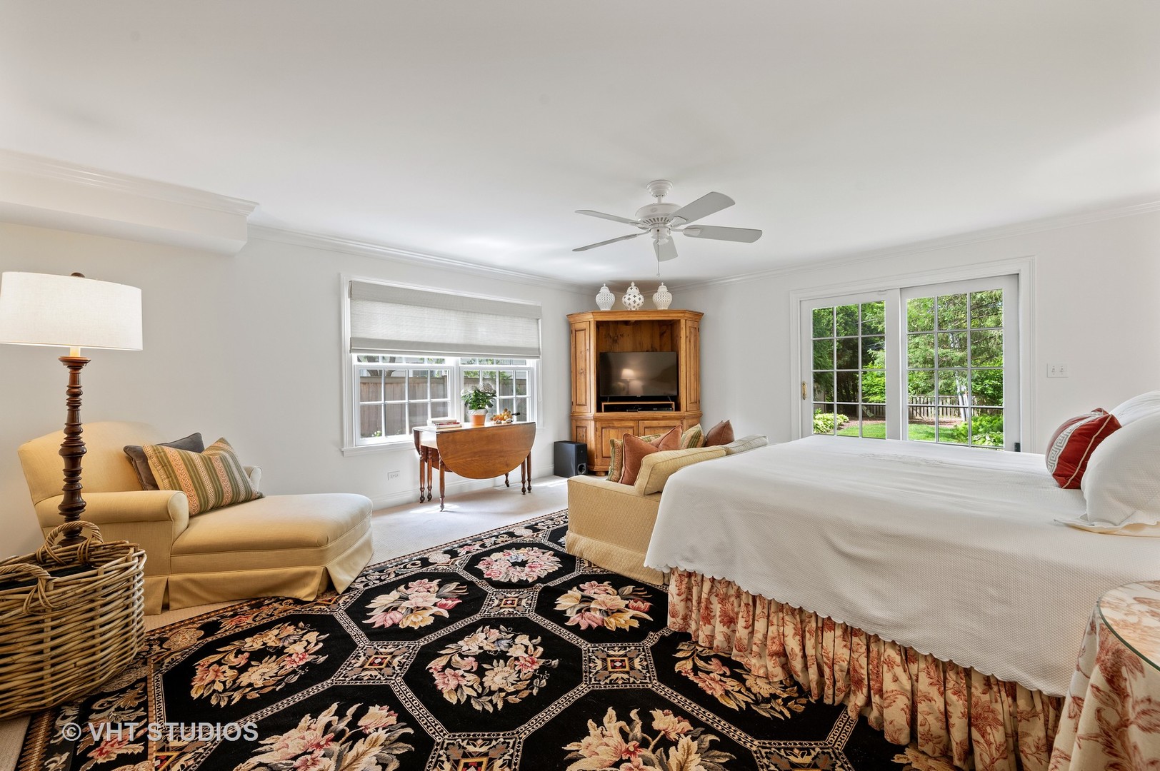1175 Hill Road Winnetka, IL 60093 - Photo 23 of 37 a bedroom with a bed a flat screen tv and a couch