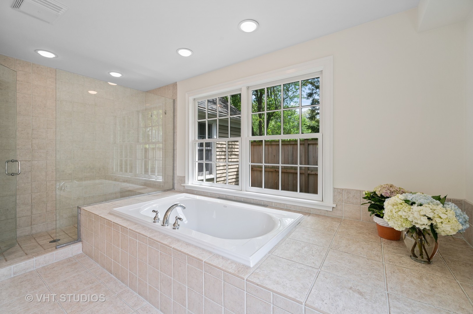 1175 Hill Road Winnetka, IL 60093 - Photo 27 of 37 a white bath tub sitting next to a window