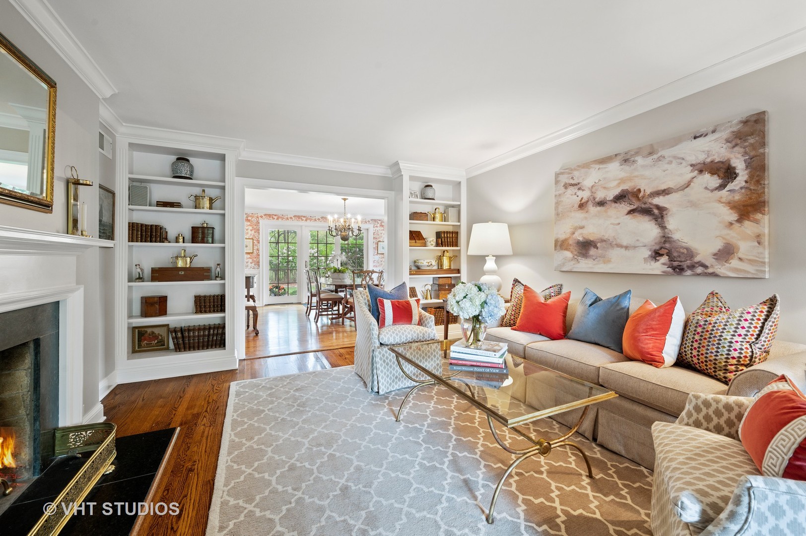 1175 Hill Road Winnetka, IL 60093 - Photo 8 of 37 a living room with furniture a flat screen tv and a fireplace