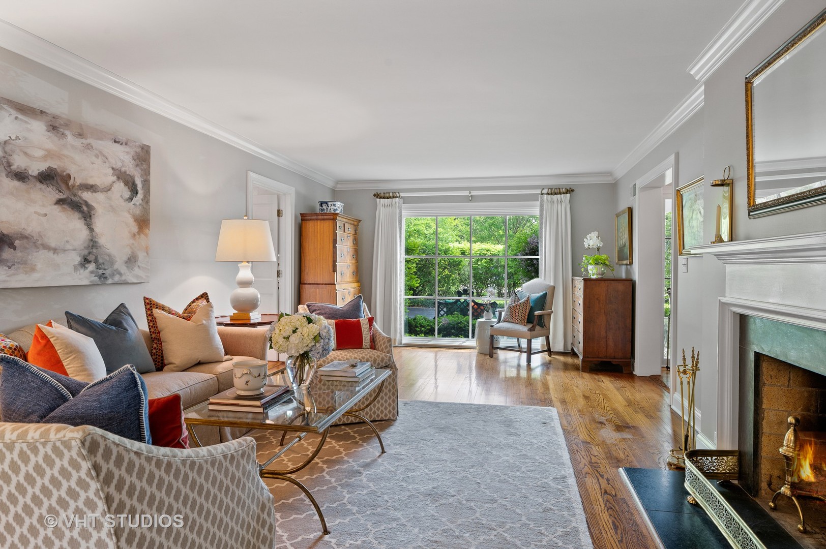 1175 Hill Road Winnetka, IL 60093 - Photo 9 of 37 a living room with furniture and a fireplace