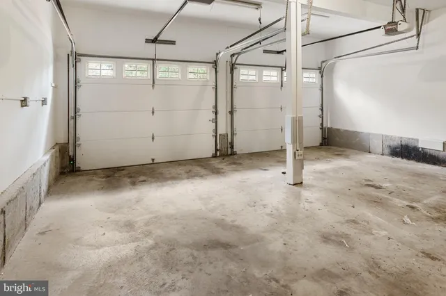 a view of a room with wooden walls