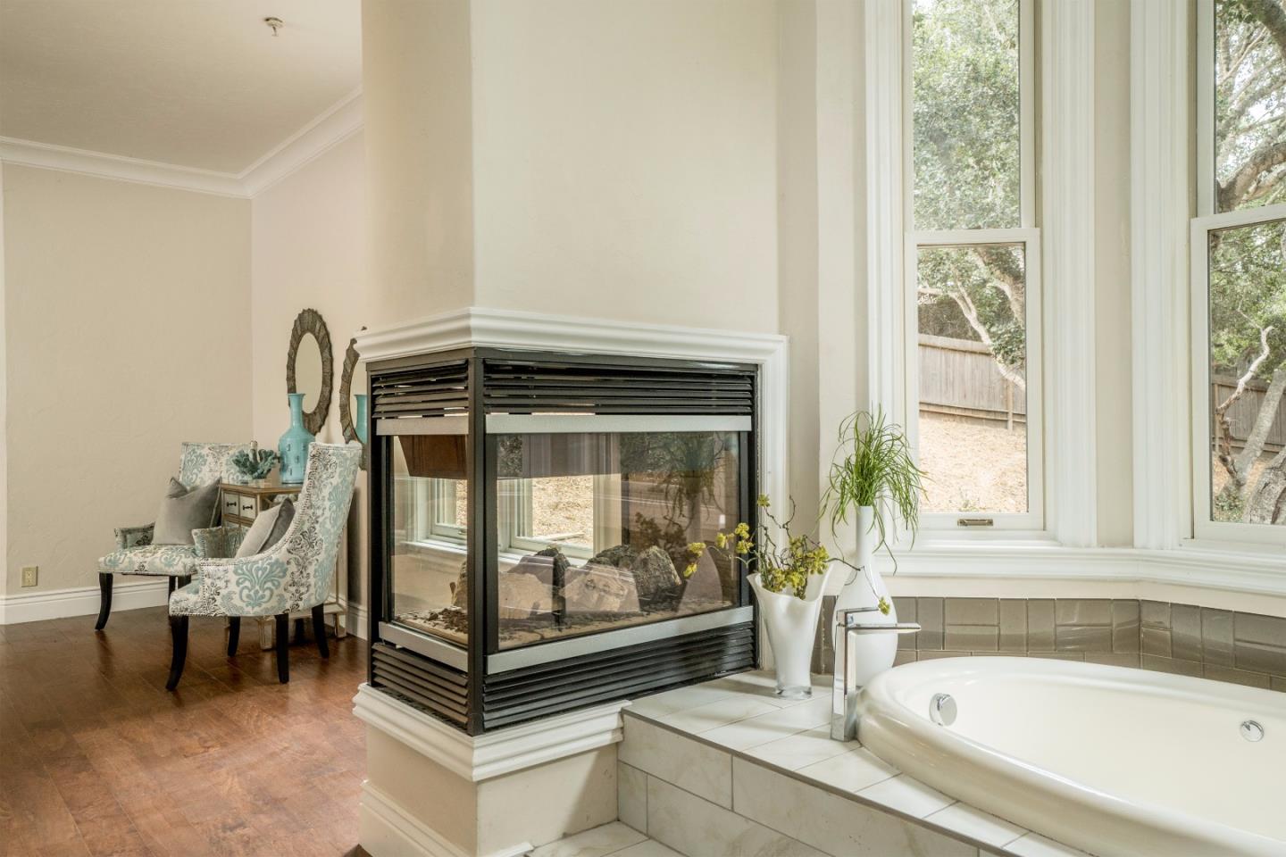 9945 Eddy Road Carmel, CA 93923 - Photo 20 of 31 a living room with furniture and a fireplace