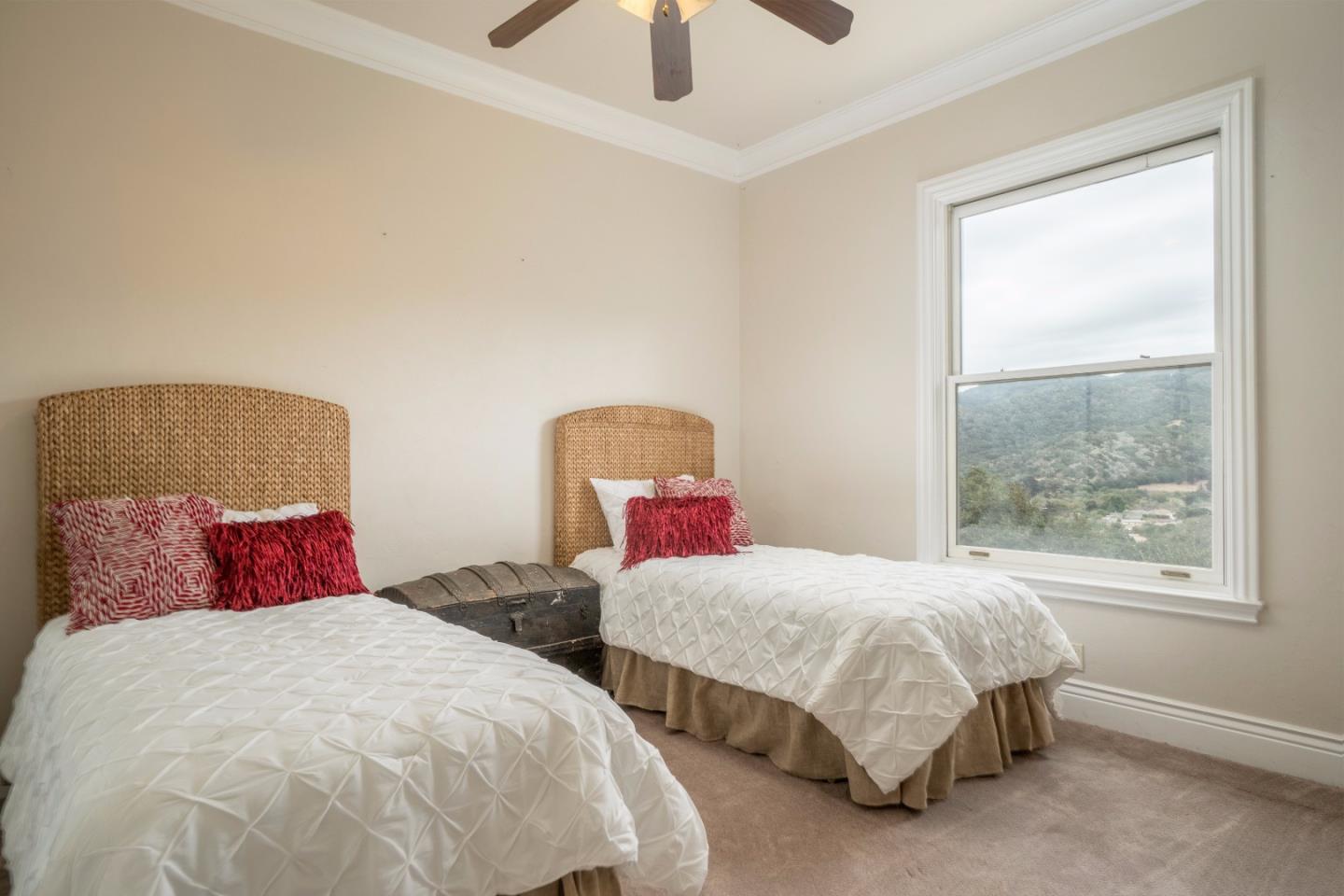 9945 Eddy Road Carmel, CA 93923 - Photo 21 of 31 a bedroom with two beds and window