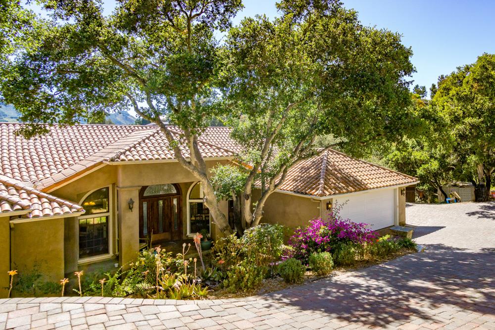 9945 Eddy Road Carmel, CA 93923 - Photo 30 of 31 a front view of a house with flowers