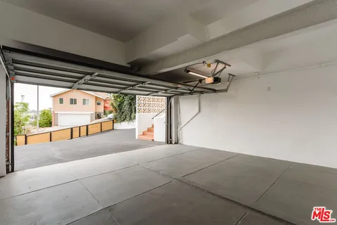 a view of a dining room with furniture window and tables