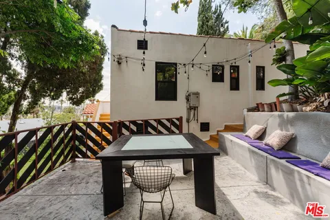 a view of a yard with a tree