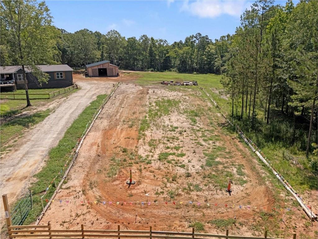 170 Anoia Road Washington, GA 30673 - Photo 34 of 46 a view of a backyard with sitting area