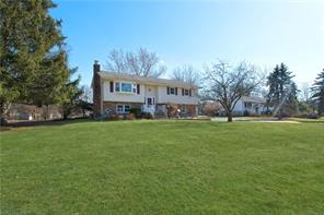 67 Jones Road Warwick, NY 10990 - Photo 1 of 1 a front view of house with yard and green space