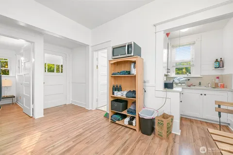 a bedroom with a bed and a lamp