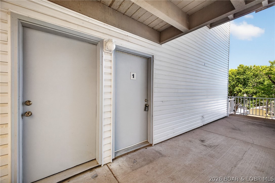 1111 Passover Road, Unit N1 Osage Beach, MO 65065 - Photo 55 of 57 Both doors to unit.