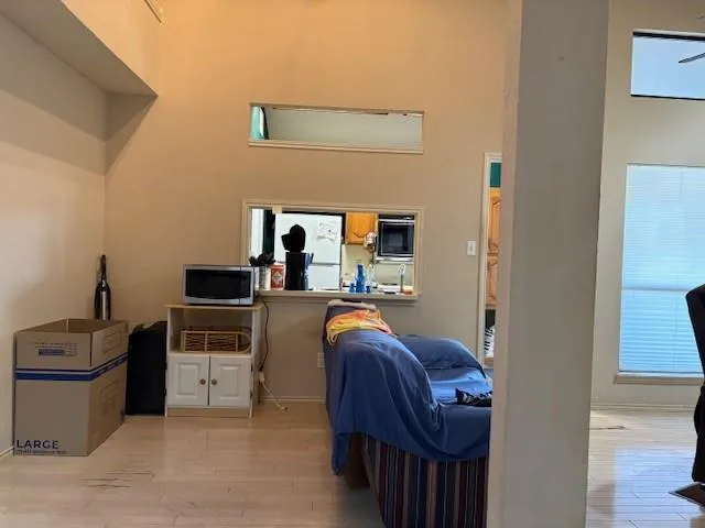 a living room with furniture a washer and dryer