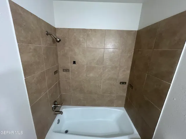 a bathroom with a bathtub