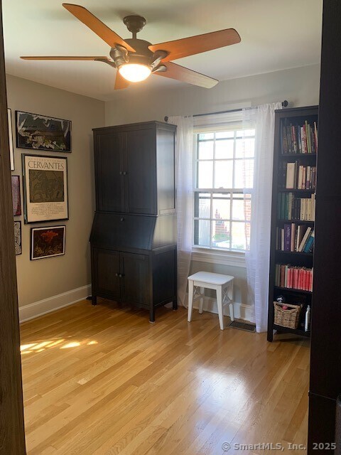 345 Courtland Avenue Bridgeport, CT 06605 - Photo 12 of 38 a view of a livingroom with furniture and staircase