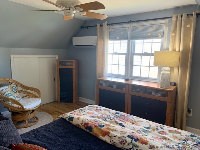 345 Courtland Avenue Bridgeport, CT 06605 - Photo 17 of 38 a bedroom with a bed and a window