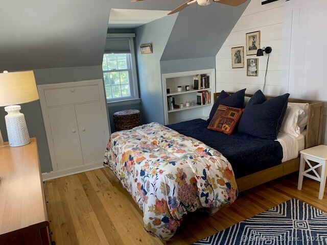 345 Courtland Avenue Bridgeport, CT 06605 - Photo 18 of 38 a bedroom with double bed and a window