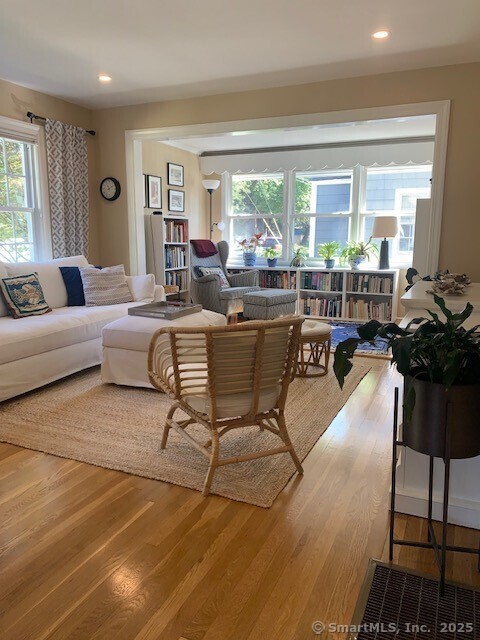345 Courtland Avenue Bridgeport, CT 06605 - Photo 4 of 38 a living room with furniture and a large window